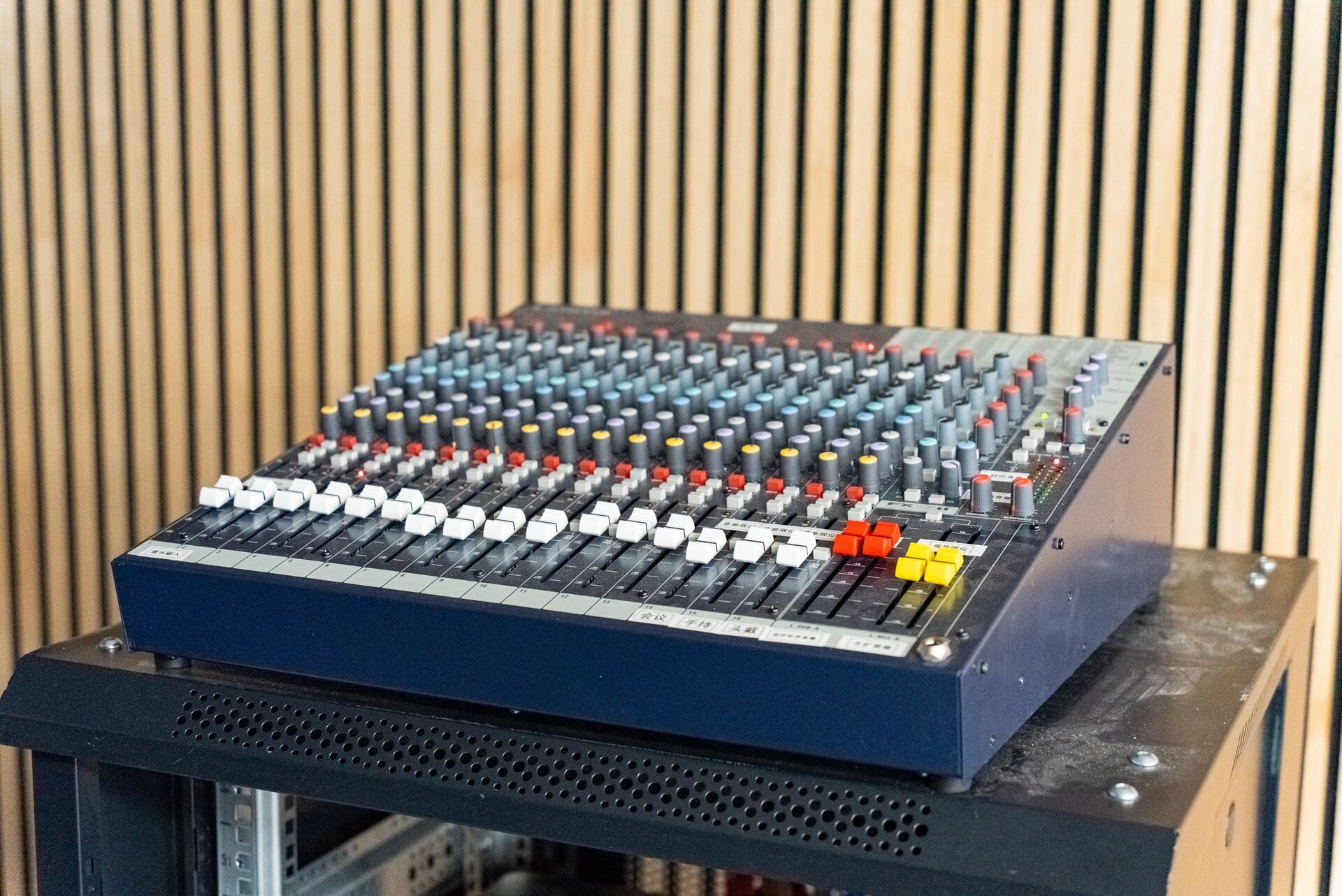 Professional audio mixing console on a rack in the Sola Pavilion sound booth
